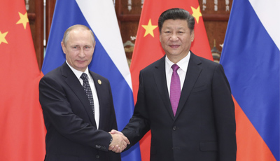 Xi Jinping trifft Putin.jpg